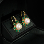 A luxurious pair of gold-plated 925 silver hook dangle earrings with ocean pearls, green agate and pink tourmaline halo.