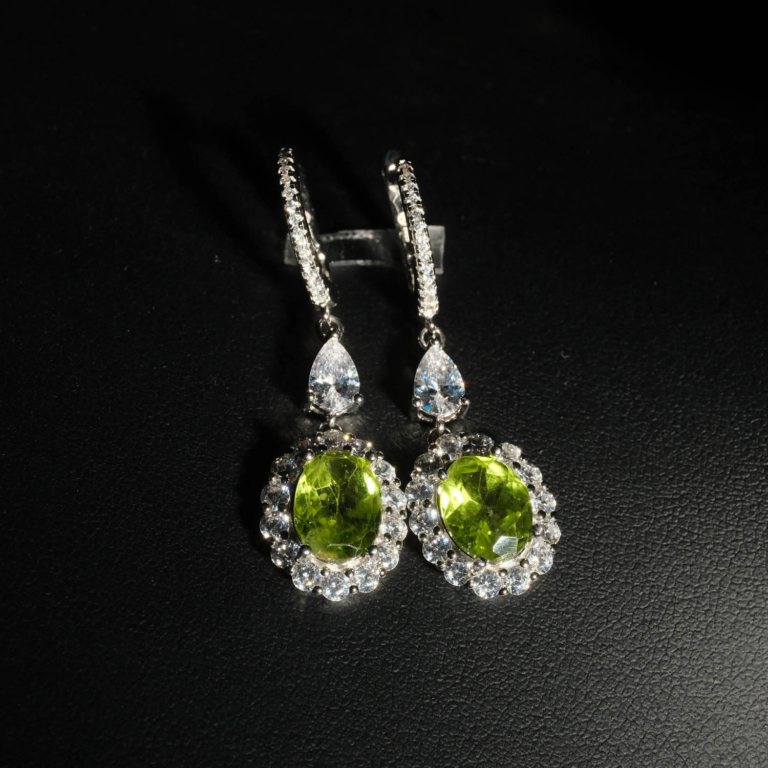 An authentic natural 3.67ct faceted oval green peridot gemstone 925 sterling silver drop halo dangle earrings.
