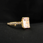 An authentic natural 2.80ct faceted emerald-cut pink kunzite gemstone 14k gold plated 925 silver pave shank ring.