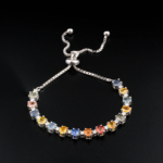An authentic natural multicolor faceted sapphire gemstone 925 sterling silver tennis slider bolo bracelet.