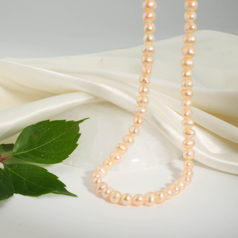An authentic natural rose pink pearl gemstone choker necklace with 925 sterling silver clasp 6-7mm.