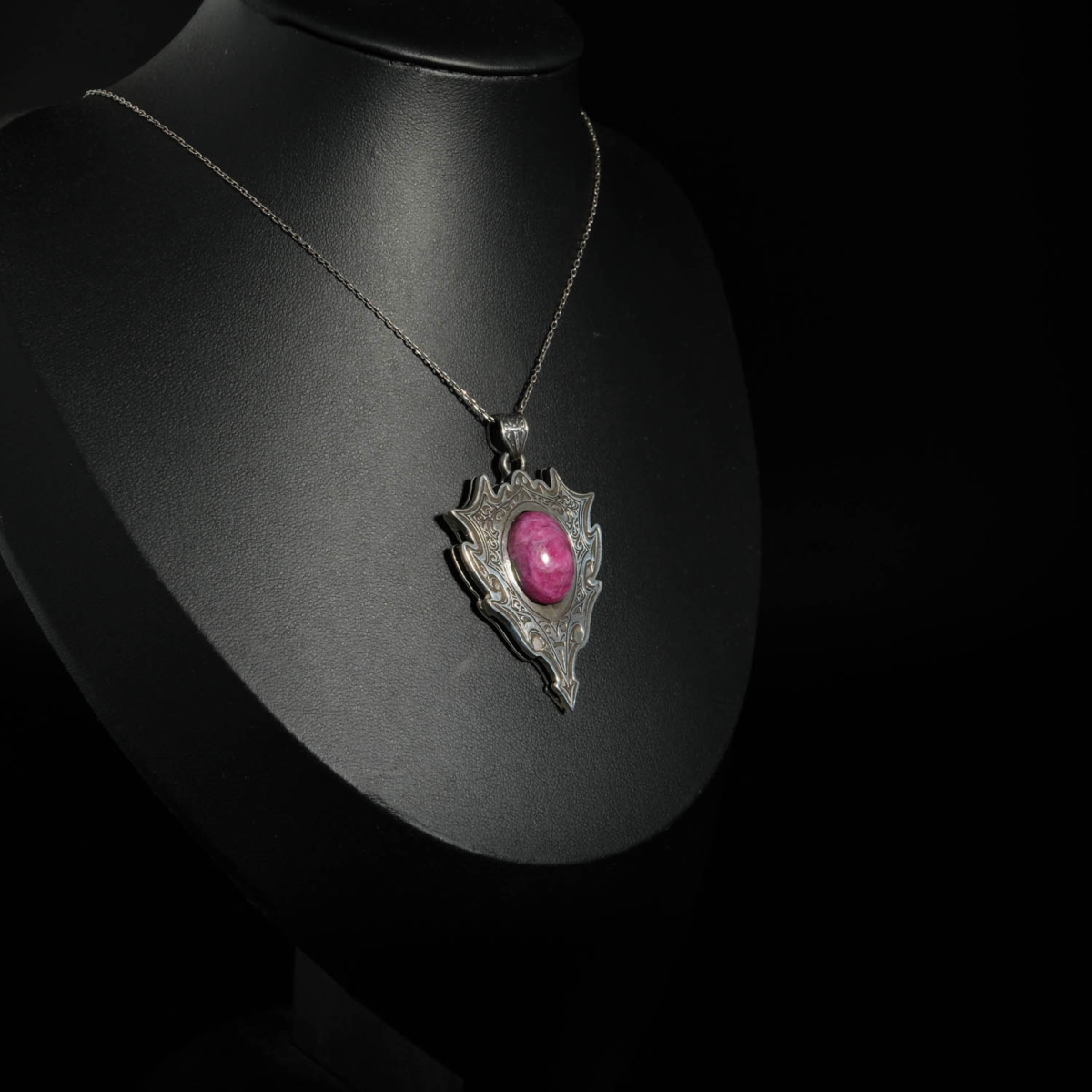 An authentic 16.75ct natural oval cabochon ruby gemstone 925 sterling silver gothic shield pendant necklace.