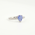 An authentic natural 1.03ct violet-blue faceted pear-cut tanzanite gemstone 925 sterling silver pave ring.