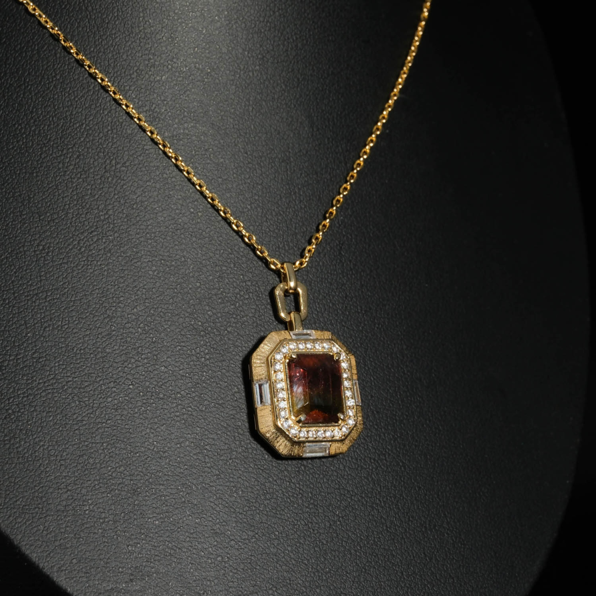 An authentic natural pink and green watermelon tourmaline gemstone baguette cut halo gold plated 925 silver pendant necklace.