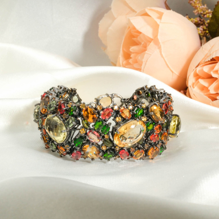 One of a kind high jewelry 925 sterling silver black rhodium cuff bracelet featuring gem grade citrine sapphires and diopside.