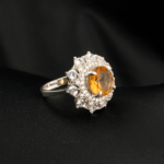 An authentic natural color-change faceted oval zultanite gemstone 925 sterling silver floral halo ring.