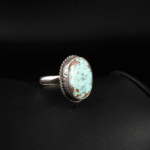 Bague classique pour femme en argent 925 sertie d'une turquoise naturelle bleu ciel avec monture torsadée