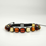 Bracelet tressé en macramé avec véritables perles d'ambre de la Baltique facettées