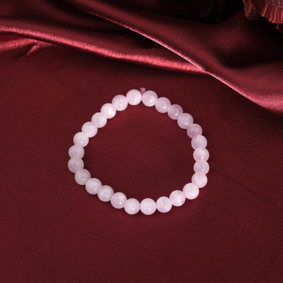 Genuine A grade natural pink kunzite gemstone 6-7 mm beaded stretch bracelet.