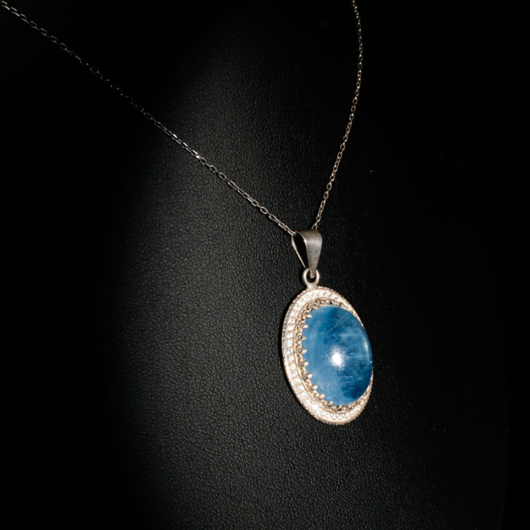 Genuine natural ocean blue oval cabochon aquamarine gemstone pendant with cubic zirconia halo 925 sterling silver chain necklace.