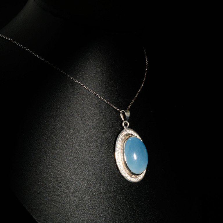 Genuine natural ocean blue oval cabochon aquamarine gemstone pendant with cubic zirconia halo 925 sterling silver chain necklace.