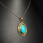 Genuine natural Arizona turquoise oval cabochon gold plated 925 sterling silver unisex pendant necklace.