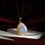 Genuine natural blue sheen moonstone teardrop cabochon yellow gold plated 925 silver pendant necklace.