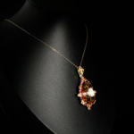 Genuine natural warm yellow pear faceted citrine gemstone pendant with iridescent opal and rubellite tourmaline accents 925 silver chain reflection.
