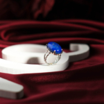 Genuine natural royal blue lapis lazuli oval cabochon 925 sterling silver twisted band ring.