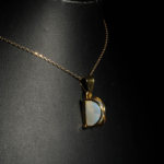 Genuine natural blue sheen moonstone curved cabochon yellow gold plated 925 silver pendant necklace.