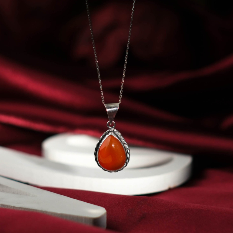 Genuine natural red carnelian agate teardrop cabochon 925 sterling silver rope frame unisex pendant necklace.