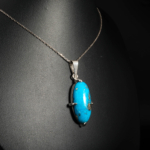 Genuine natural turquoise cabochon with golden pyrite inclusions 925 sterling silver unisex pendant necklace.