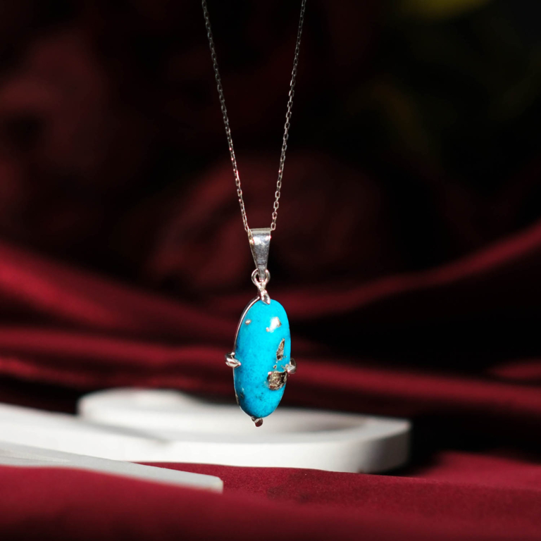 Orijinal doğal pirit damarlı turkuaz firuze taşı uzun oval kabaşon 925 ayar gümüş tırnaklı unisex kolye.